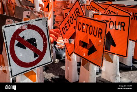 Multiple Detour And No Turn Road Signs At Construction Site Stock