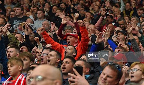 Liverpool Fans go mad at the end of the Premier League match between ...