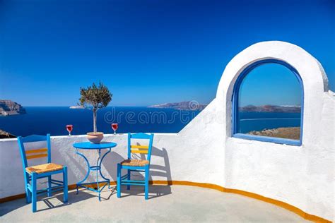 Santorini, Greece. Outdoor Seating Area with Sea and Horizon Views. Two ...