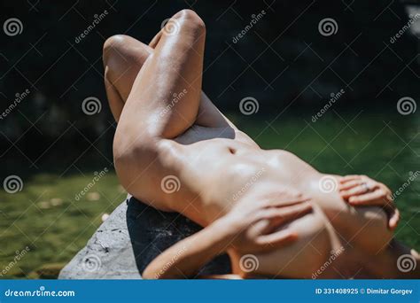 Nude Woman Sunbathing By The Water On A Sunny Day Stock Image Image Of Lifestyle Exposure