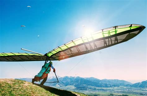 Hang Glider Launch From Top Of Hill Stock Image - Image of hangglider ...