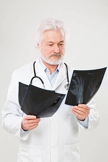 Handsome Elderly Doctor With Radiograph Person Doctor Radiograph Photo