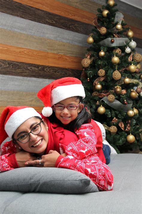 Single Divorced Mom And Daughter Latina Brunettes With Glasses Dressed In Pajamas Play In Bed