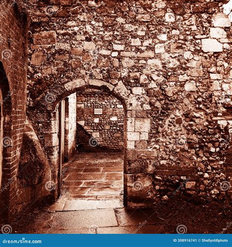 Antique Historic Secret Door in a Stone Wall Stock Image - Image of
