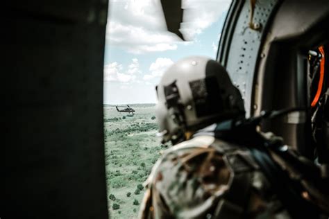 Soldier inside a Helicopter · Free Stock Photo