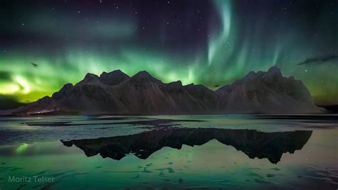 Northern Lights over Vestrahorn Mountain from Stokksnes, Iceland