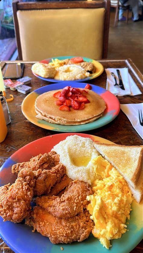 Three Plates With Different Types Of Food On Them