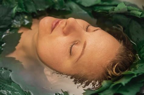 Premium Photo Attractive Blonde Woman Bathes In Medicinal Herbs