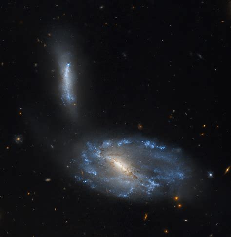 Hubble Studies a Sparkling Galaxy Pair - NASA Science