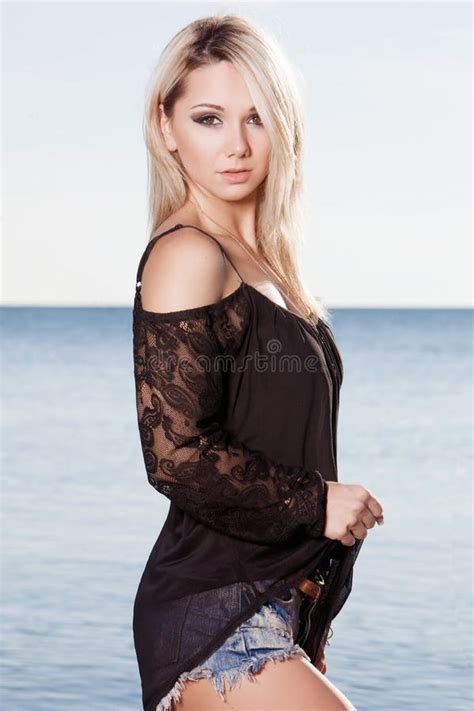 Pretty Blonde Model Posing On The Beach Stock Photo Image Of Pretty Blue 107348752