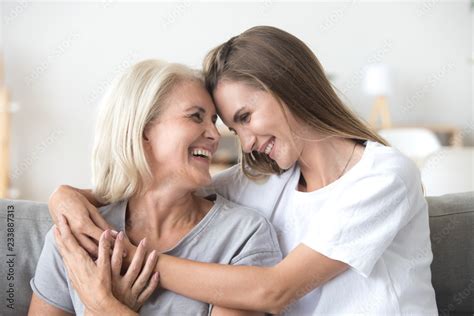 Happy Loving Older Mature Mother And Grown Millennial Daughter Laughing