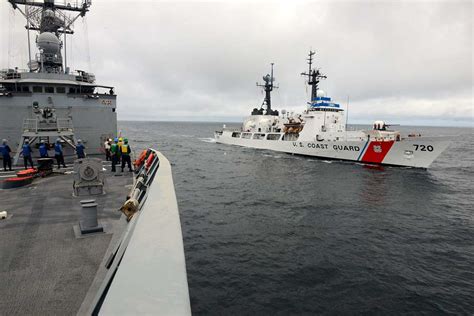 The guided missile frigate USS Ingraham (FFG 61), left, - PICRYL ...