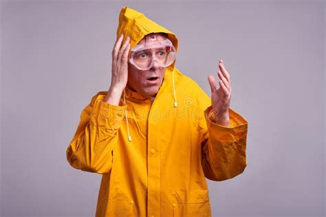 Man In Yellow Raincoat Stock Image Image Of Jacket 191442229