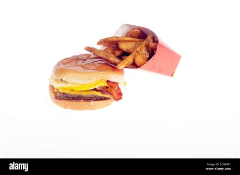 Wendy S Baconator Breakfast Sandwich With Seasoned Potatoes Stock Photo