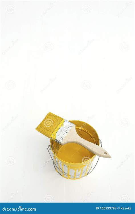 Yellow Paint Can And Brush Stock Image Image Of Background