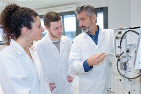 Students Interacting with Teacher during Science Class Stock Photo ...