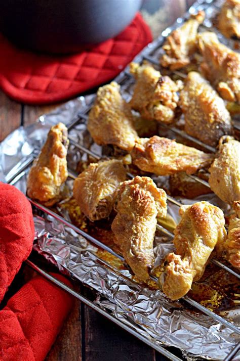 Chicken Wings On A Baking Sheet Ready To Be Baked In The Oven For