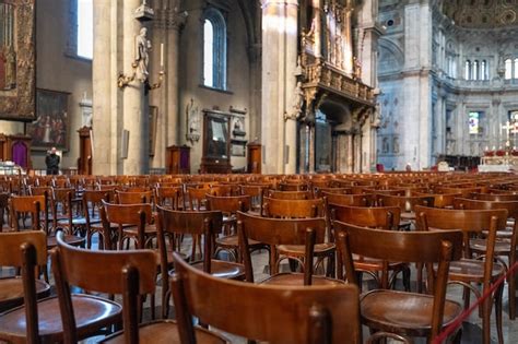 Premium Photo A Large Empty Church With Wooden Chairs