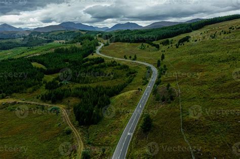 Aerial view of winding road in Scotland 15633066 Stock Photo at Vecteezy