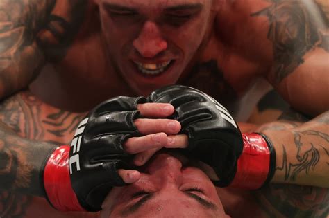 Charles Oliveira def. Dustin Poirier at UFC 269: Best photos