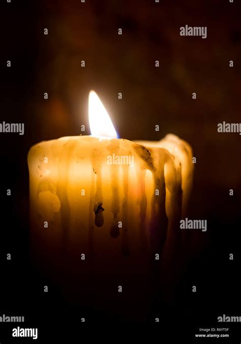 Candle in the dark Stock Photo - Alamy