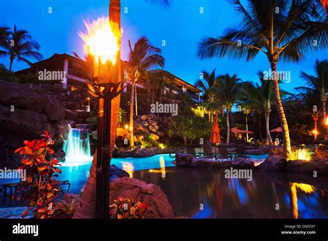 Tropical Resort Pool at Sunset in Hawaii Stock Photo - Alamy