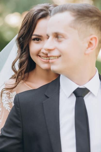 Premium Photo Portrait Of Happy Bride And Groom With Head To Head In