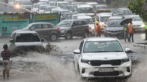 Delhi Witnesses Heavy Rainfall Thunderstorm Delhi Police Issues