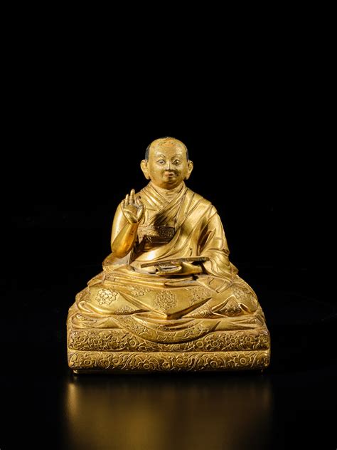 An Inscribed Gilt Copper Alloy Figure Of The Fifth Dalai Lama Tibet