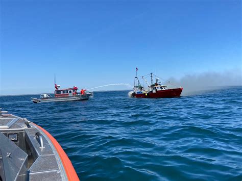 Video Three Rescued After Fishing Boat Catches Fire Sinks Off Point