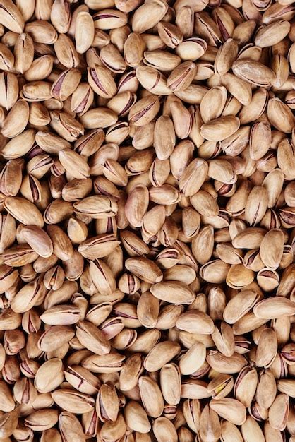 Premium Photo Background Of Inshell Pistachios Nuts Closeup