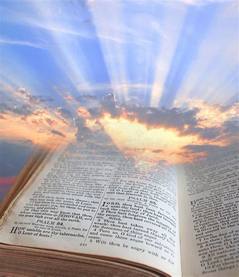 Bible Light Photo Of Sun Rays Shining Through Pages Of The Bible