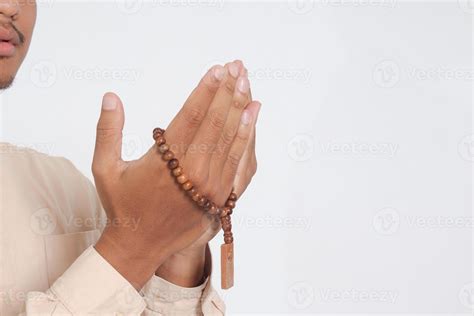 Close Up Portrait Of Religious Asian Muslim Man In Koko Shirt With