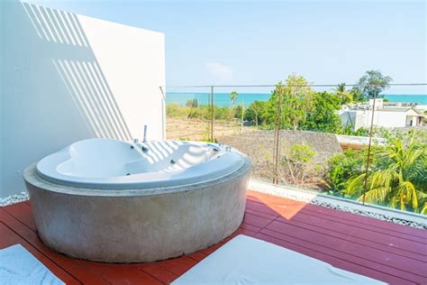 Premium Photo | Jacuzzi bath tub on balcony