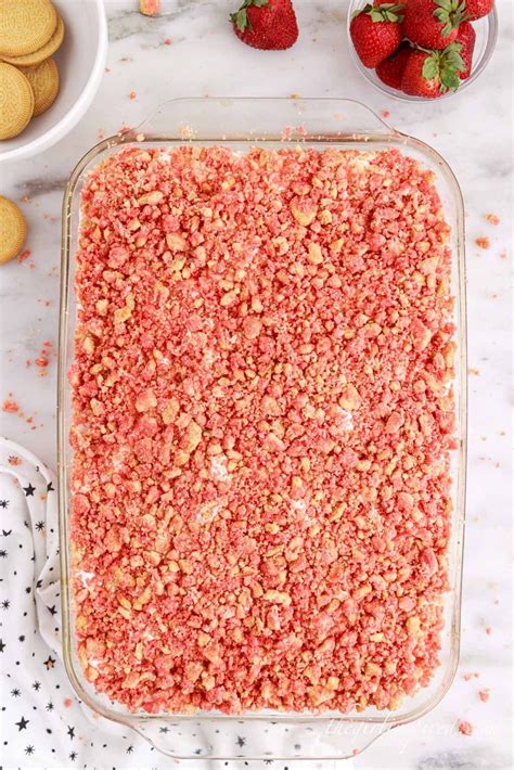 This Stunning Strawberry Crunch Poke Cake Is Filled With A Strawberry Milk Gelatin Mixture