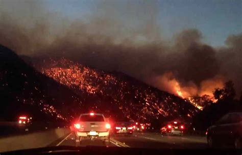 L.A.'s 405 Freeway Shut Down as Wildfire Near Getty Destroys Homes ...