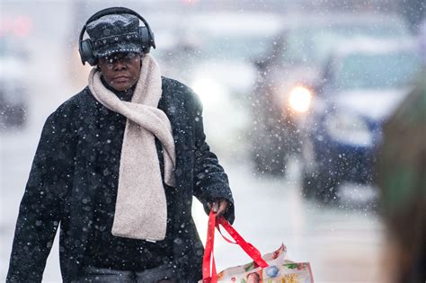 Winter Storm Brings Snow Frigid Temperatures High Winds To Chicago