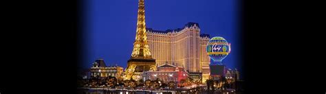 the las vegas hotel and casino is lit up at night with colorful balloons floating in the water