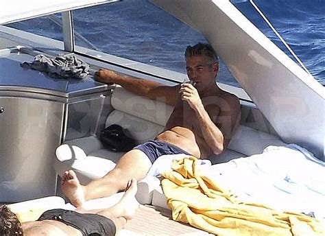 Shirtless Photos Of George Clooney Boating With Friends In Italy