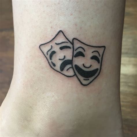 Tragedy and comedy mask theatre tattoo | Theatre tattoo, Theatre masks, Mask tattoo