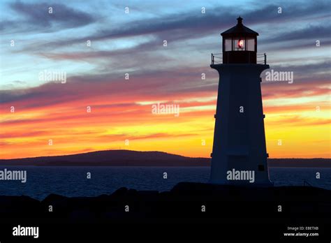 Peggys Point Lighthouse At Sunset Peggys Cove Nova Scotia Canada