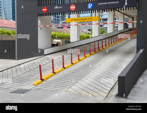 Entrance To Car Park Ramp Slope Way On Front Of Building Stock Photo