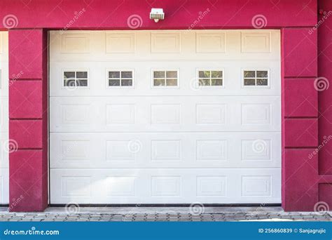 Red Facade Of Home With Home Garage Stock Image Image Of Exterior