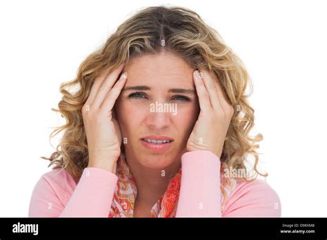 Blonde Woman Suffering With Headache Thus Touching Her Temples Stock Photo Alamy