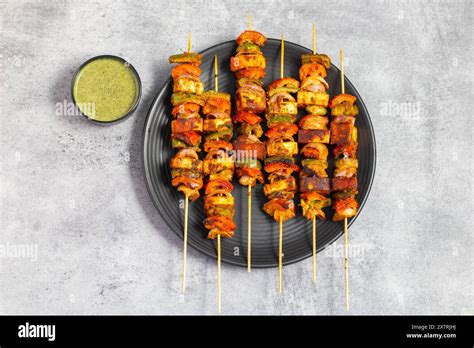 selective focus of famous Indian dish Paneer Tikka Masala Tandoor or ...