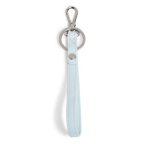 a keychain with a metal ring hanging from it's side on a white background