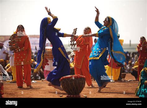 Young Sikh girls dancing, Giddha folk dance, celebrations of 300th year of consecration of ...