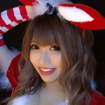 Playful Japanese Girl Rina Serino Peels Off Sexy Pink Lingerie Photos