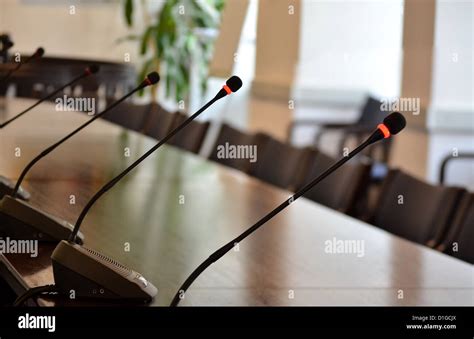 Microphone in a conference room Stock Photo - Alamy