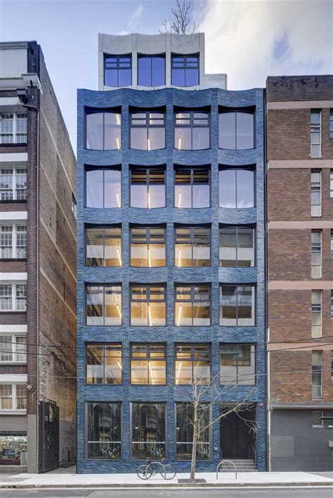 Aquamarine Glazed Bricks Cover The Exterior Of This Building